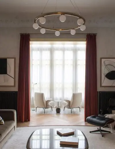 Arflex Sofa - Punt Mobles Side Board - Pendant Lamp by CTO - Applique lights by Catellani&Smith - Dedar Velvet Curtains