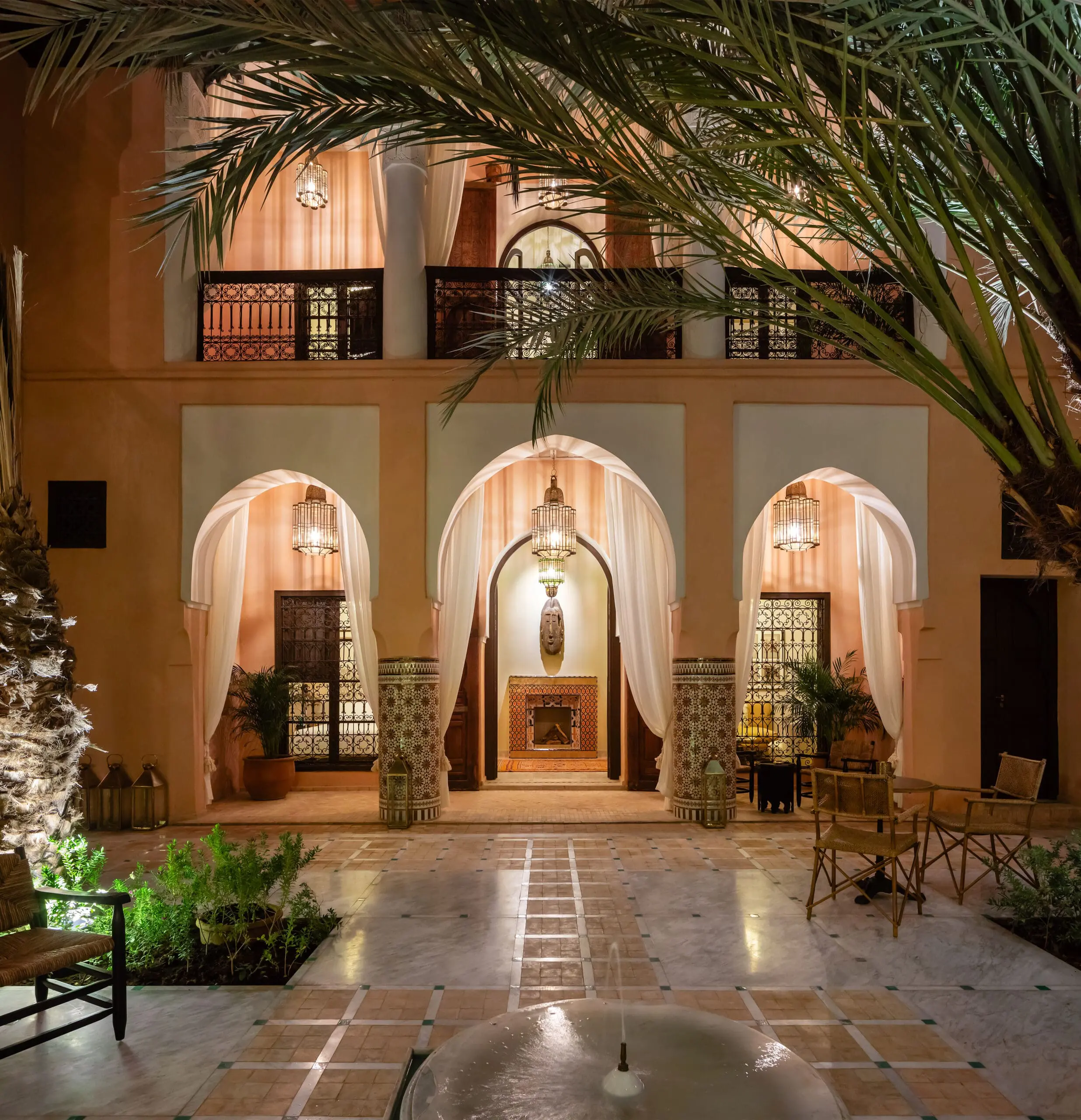 Recdi8 Living Interior Design - Marrakech Riad Restoration - Patio at Night with the MMUDDU Suite in the Background